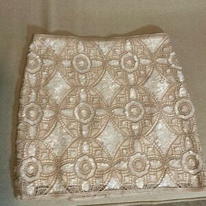 Express sequin mini skirt. Size 8, ivory and pale pink.